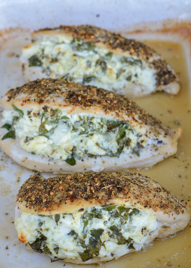 This Spinach and Feta Stuffed Chicken is packed with two different cheese, fresh spinach and garlic and is rubbed with a delicious herb mix. Ready in 30 minutes, this meal will become one of your weeknight favorites!