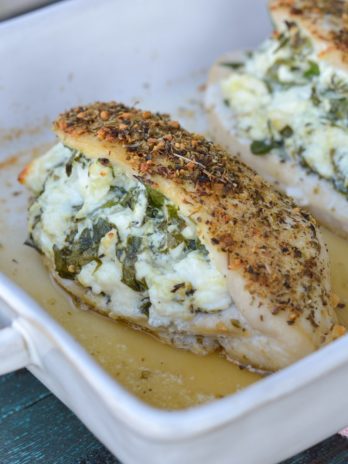 This Spinach and Feta Stuffed Chicken is packed with two different cheese, fresh spinach and garlic and is rubbed with a delicious herb mix. Ready in 30 minutes, this meal will become one of your weeknight favorites!