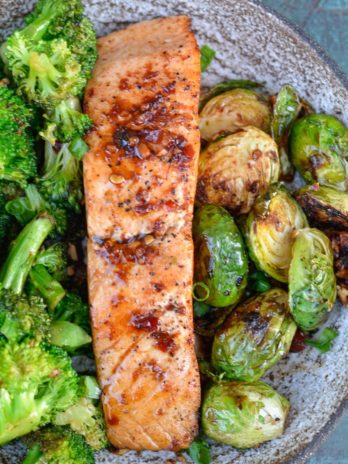 This Asian Salmon recipe is an easy and healthy weeknight dinner ready in under 20 minutes! This simple salmon dish is low carb and keto-friendly! 