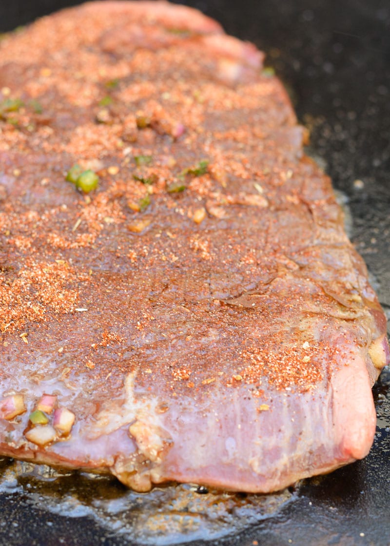 This delicious Marinated Flank Steak is a quick, low carb dish bursting with flavor! Easy keto meal prep recipe for fajitas, tacos, breakfast burritos, and more!