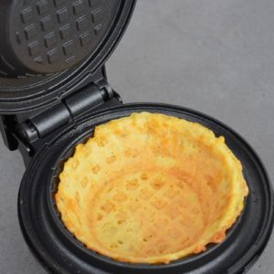 Learn how to make a chaffle bowl for a fun low carb meal prep! This easy keto chaffle bread bowl is great for salads, breakfast bowls, and more!