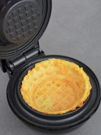 Learn how to make a chaffle bowl for a fun low carb meal prep! This easy keto chaffle bread bowl is great for salads, breakfast bowls, and more!