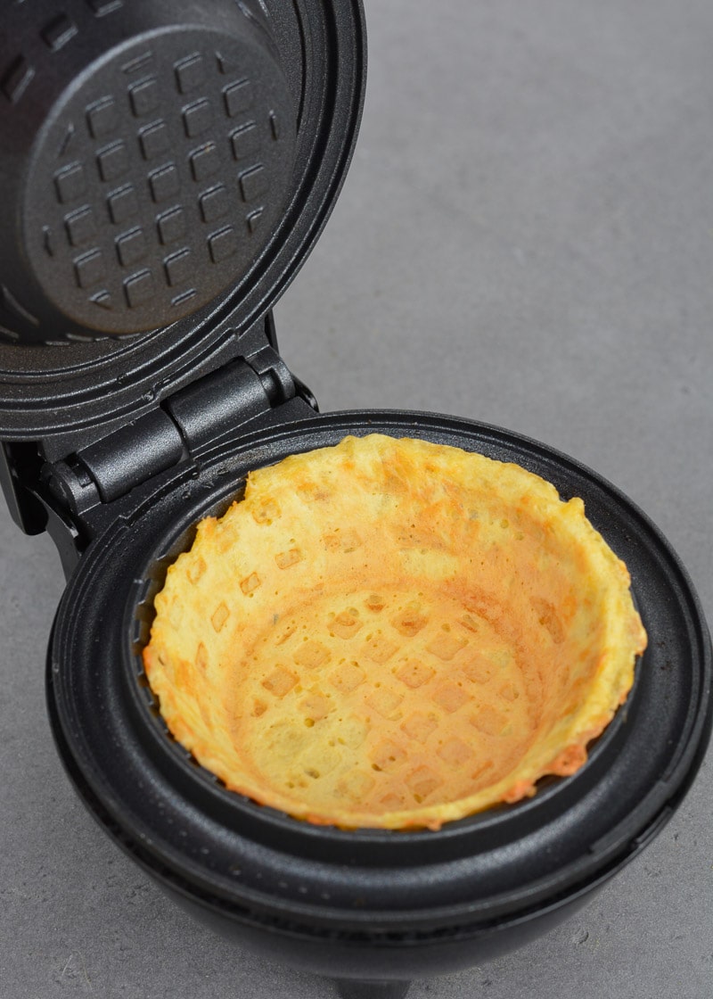 Learn how to make a chaffle bowl for a fun low carb meal prep! This easy keto chaffle bread bowl is great for salads, breakfast bowls, and more!