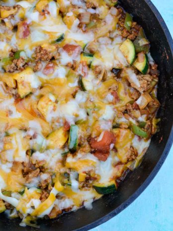 Keto Taco Casserole is the perfect healthy dinner recipe! This low carb dinner is packed with taco meat, zucchini, peppers, onions, tomatoes and cheese! 