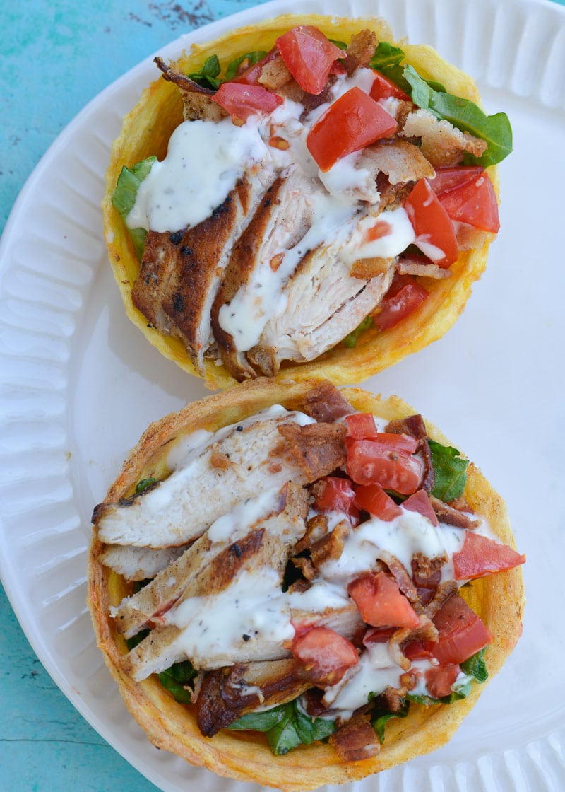 This Keto Salad Bowl is the perfect healthy lunch! Tender chicken is paired with greens, vegetables and ranch inside of a delicious chaffle bowl! Enjoy this keto meal at only 2.9 net carbs!