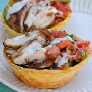 This Keto Salad Bowl is the perfect healthy lunch! Tender chicken is paired with greens, vegetables and ranch inside of a delicious chaffle bowl! Enjoy this keto meal at only 2.9 net carbs!