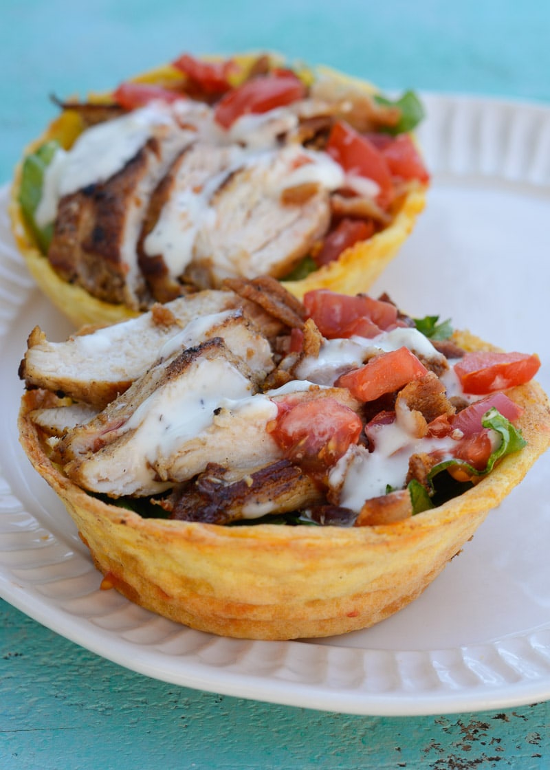 This Keto Salad Bowl is the perfect healthy lunch! Tender chicken is paired with greens, vegetables and ranch inside of a delicious chaffle bowl! Enjoy this keto meal at only 2.9 net carbs!