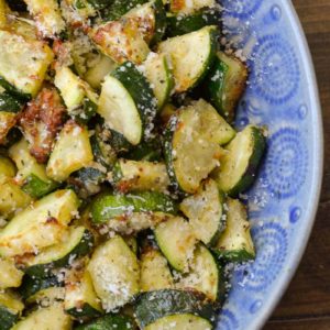 Learn how to make delicious Air Fryer Zucchini with Parmesan! This keto side dish has only four ingredients and is ready in under 10 minutes!