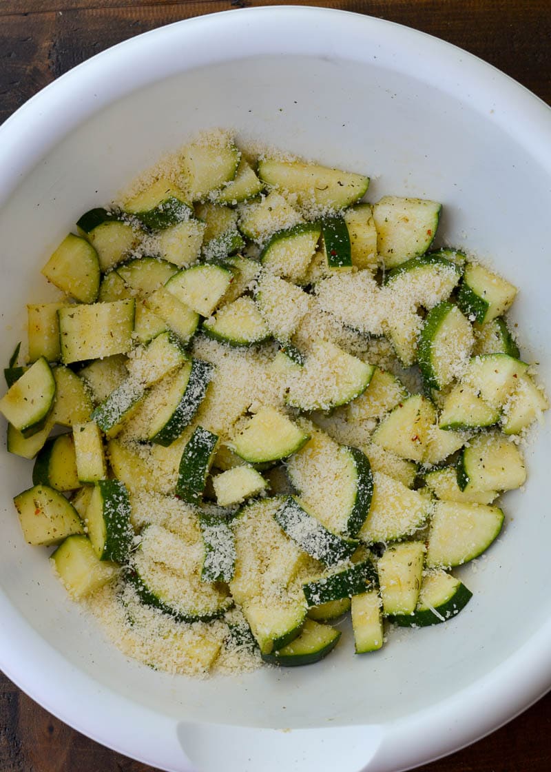 Learn how to make delicious Air Fryer Zucchini with Parmesan! This keto side dish has only four ingredients and is ready in under 10 minutes!
