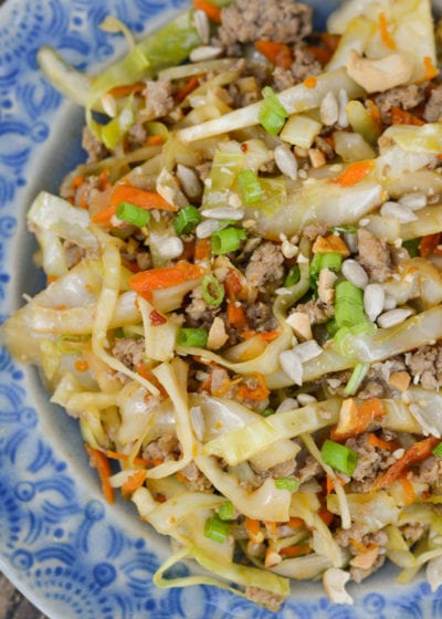 Egg Roll in a Bowl is an easy, healthy dinner that is ready in under 20 minutes! This easy pork stir fry recipe is loaded with meat, vegetables and a sesame sauce. 