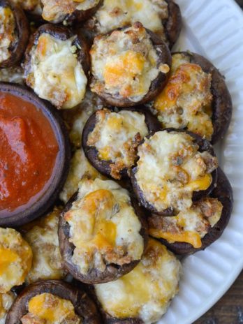These Italian Sausage Stuffed Mushrooms are the perfect keto appetizer! Using only five ingredients, this low carb recipe is ready in under 15 minutes and is full of flavor!