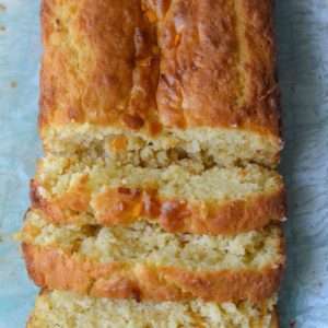 This sweet Mango Bread is packed with dried mango, coconut and vanilla it is the perfect gluten free quick bread recipe!