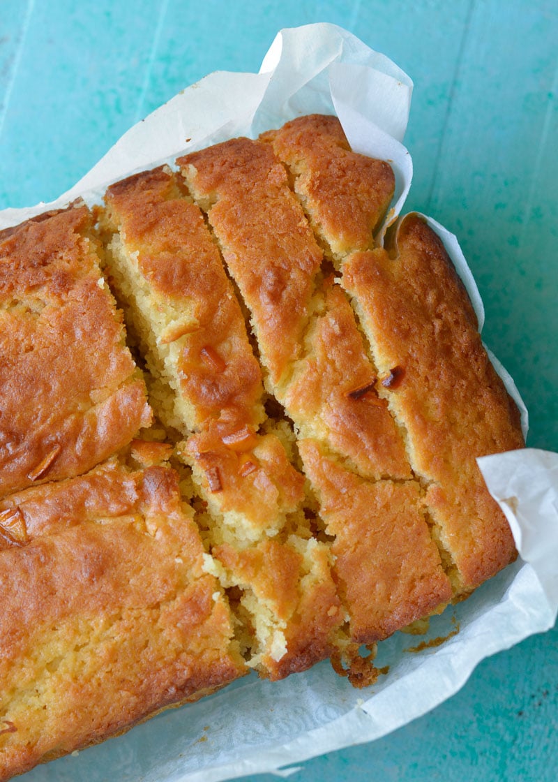 This sweet Mango Bread is packed with dried mango, coconut and vanilla it is the perfect gluten free quick bread recipe!