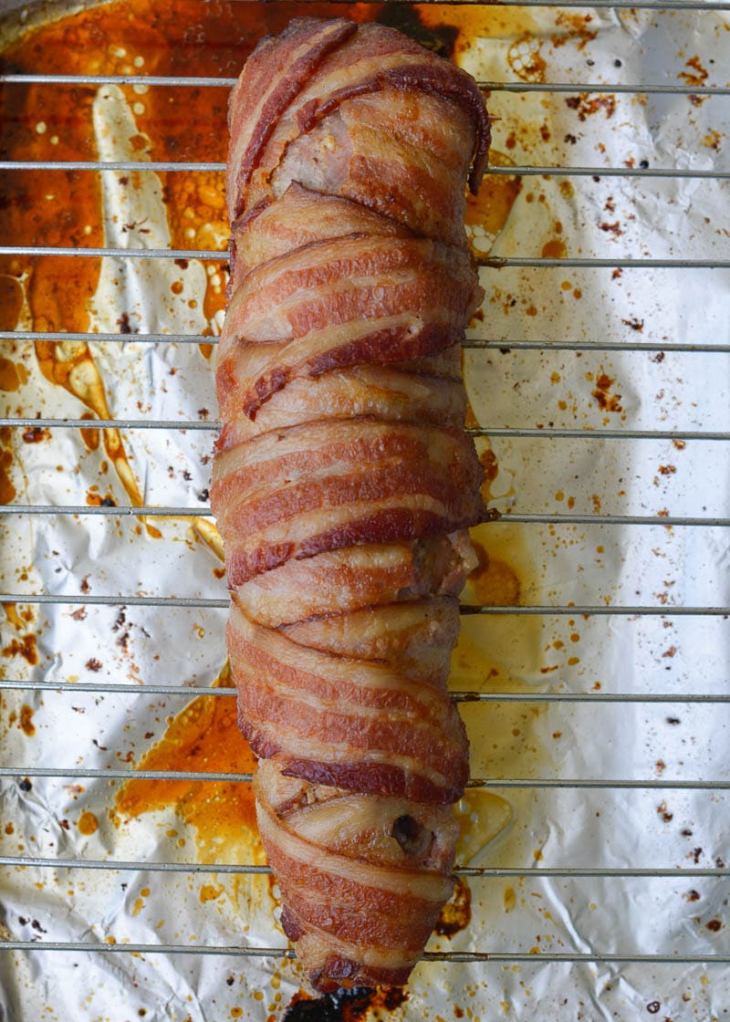 This Bacon Wrapped Pork Tenderloin is the juiciest, most flavorful dinner you can put on the table! This keto dinner has under 1 net carb per serving and is perfect for meal prepping.