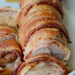 This Bacon Wrapped Pork Tenderloin is the juiciest, most flavorful dinner you can put on the table! This keto dinner has under 1 net carb per serving and is perfect for meal prepping.