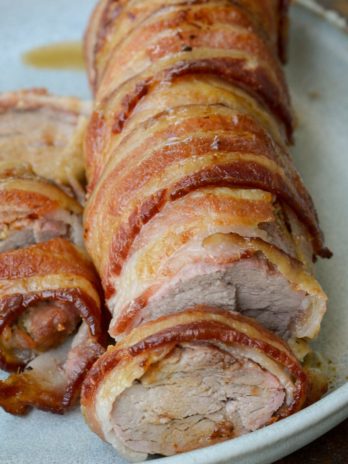 This Bacon Wrapped Pork Tenderloin is the juiciest, most flavorful dinner you can put on the table! This keto dinner has under 1 net carb per serving and is perfect for meal prepping.