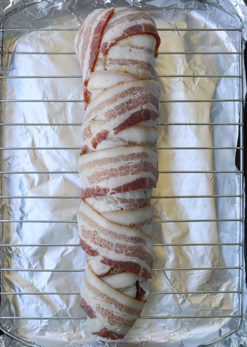 This Bacon Wrapped Pork Tenderloin is the juiciest, most flavorful dinner you can put on the table! This keto dinner has under 1 net carb per serving and is perfect for meal prepping.