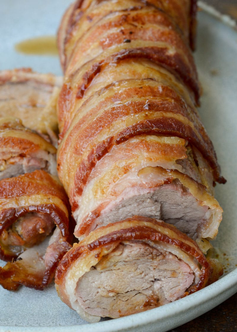 This Bacon Wrapped Pork Tenderloin is the juiciest, most flavorful dinner you can put on the table! This keto dinner has under 1 net carb per serving and is perfect for meal prepping.