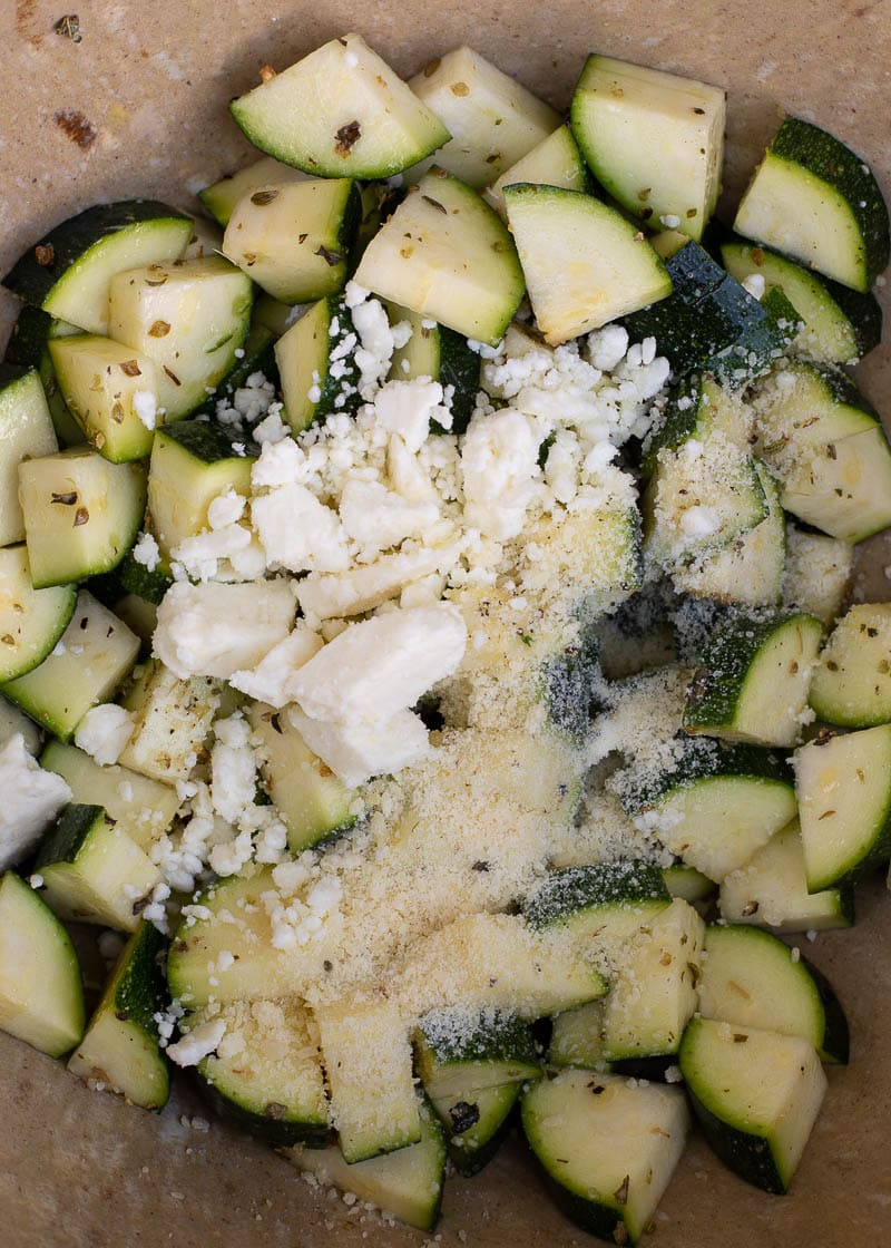 Air Fryer Zucchini with Feta is an easy, flavorful side dish that requires just a few basic ingredients! This keto side dish is ready in under 10 minutes and has less than 4 net carbs!