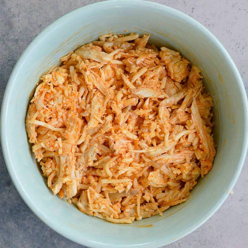 This Cheesy Buffalo Chicken Quesadilla is the ultimate weeknight dinner! Shredded chicken is combined with blue cheese, mozzarella and buffalo sauce and is cooked to perfection!