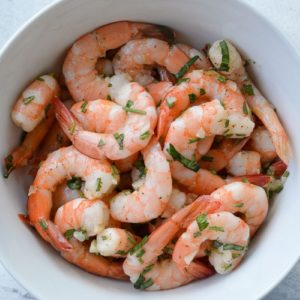 This easy Marinated Shrimp is the perfect no-cook recipe for sprucing up some plain cocktail shrimp! It's a great party appetizer, salad topper, or wrap filling for under 1 carb per serving.