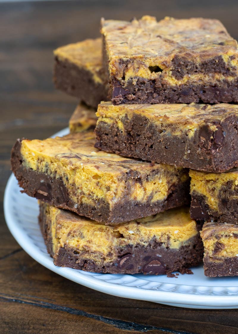 These Pumpkin Cheesecake Brownies are gooey, chocolatey and filled with fall flavor! This keto dessert is less than 3 net carbs and will become one of your favorite recipes!