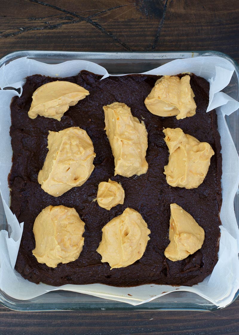 These Pumpkin Cheesecake Brownies are gooey, chocolatey and filled with fall flavor! This keto dessert is less than 3 net carbs and will become one of your favorite recipes!