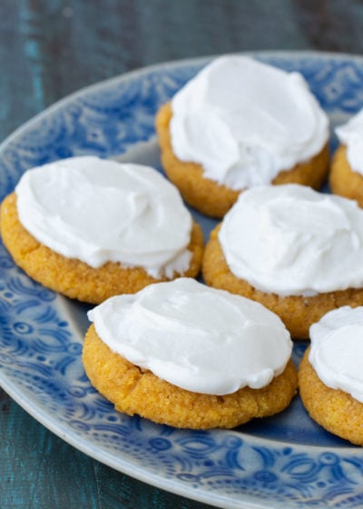 These Pumpkin Sugar Cookies with Cream Cheese Frosting are super indulgent while being low carb, grain and sugar free! Enjoy a a soft, chewy iced pumpkin cookie for just for only 2 net carbs!