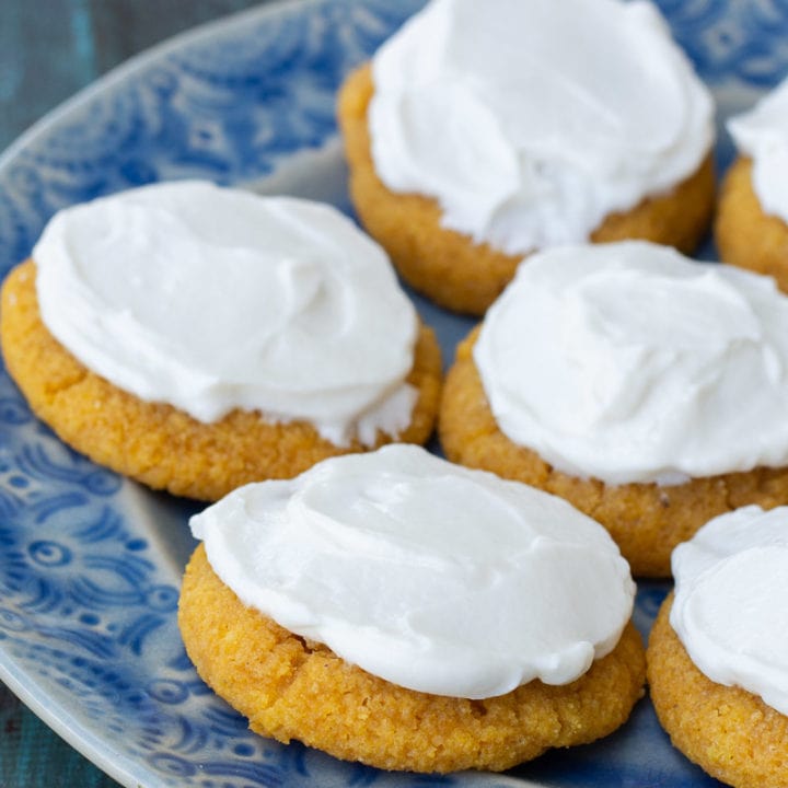 These Pumpkin Sugar Cookies with Cream Cheese Frosting are super indulgent while being low carb, grain and sugar free! Enjoy a a soft, chewy iced pumpkin cookie for just for only 2 net carbs!