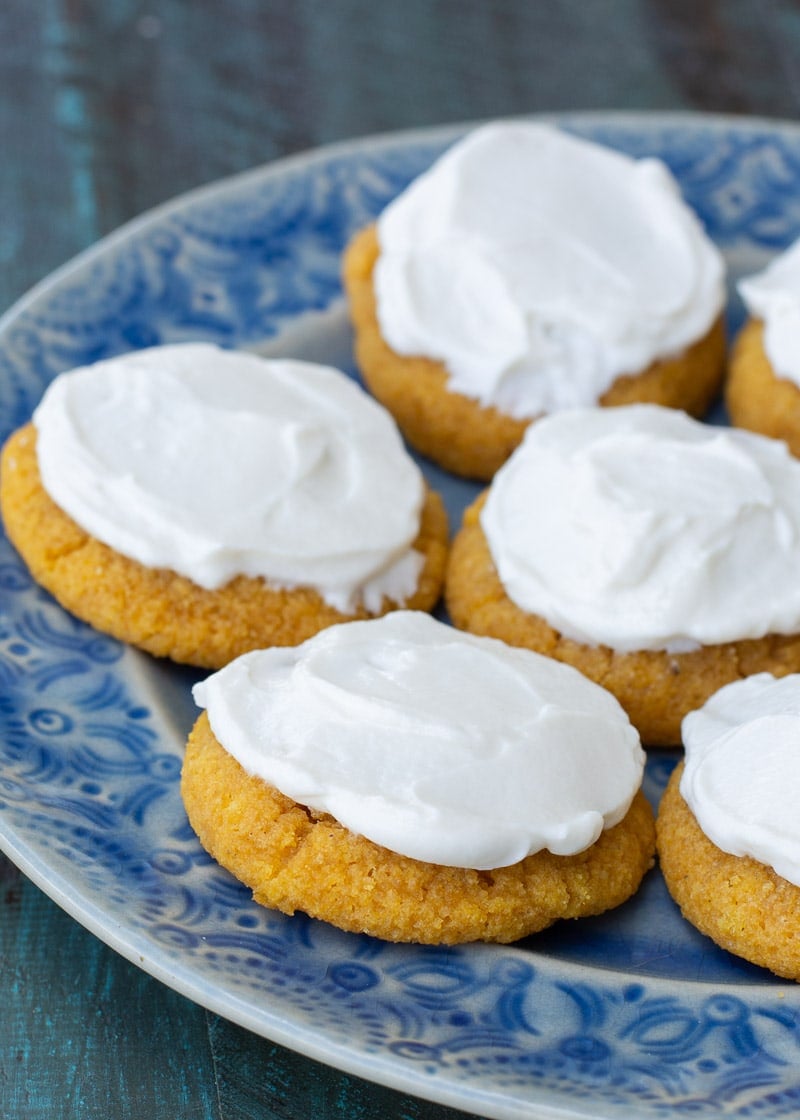 These Pumpkin Sugar Cookies with Cream Cheese Frosting are super indulgent while being low carb, grain and sugar free! Enjoy a a soft, chewy iced pumpkin cookie for only 2 net carbs!