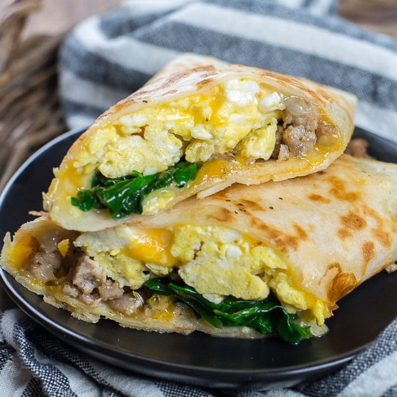 This Sausage Burrito is packed with sausage, eggs, cheese and spinach! This meal is super satisfying and is perfect for meal prep!