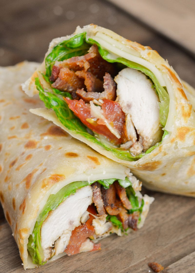 This Chicken Caesar Wrap is packed with juicy chicken, tangy Caesar dressing, tomatoes, lettuce, and two types of cheese. This healthy lunch recipe can be meal prepped and made low-carb, or gluten free, too!