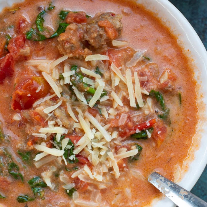 This Creamy Tomato Soup with Sausage and Spinach is the ultimate low carb comfort food! This is a one pot meal that is ready in under 30 minutes!