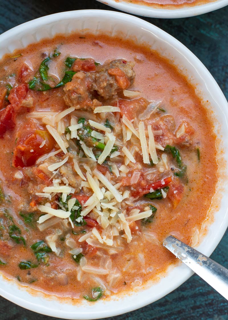 This Creamy Tomato Soup with Sausage and Spinach is the ultimate low carb comfort food! This is a one pot meal that is ready in under 30 minutes!