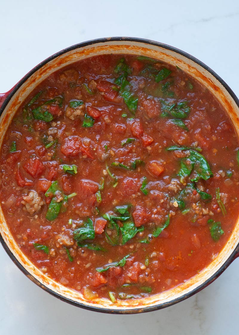 This Creamy Tomato Soup with Sausage and Spinach is the ultimate low carb comfort food! This is a one pot meal that is ready in under 30 minutes!