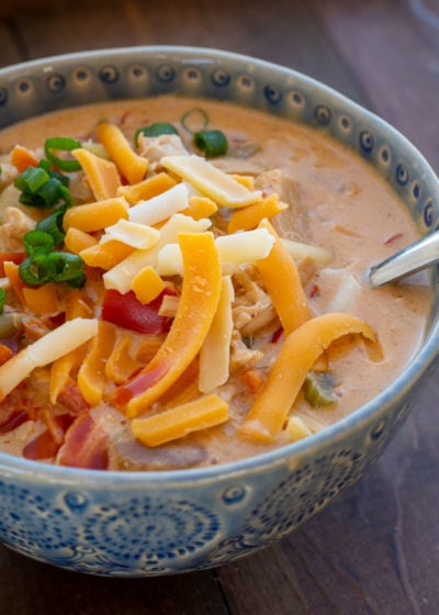 This Creamy Cajun Chicken Soup is loaded with tender chicken, peppers, onions, celery and cajun spices! You can enjoy a large serving of this cheesy keto soup recipe for only 8 net carbs!