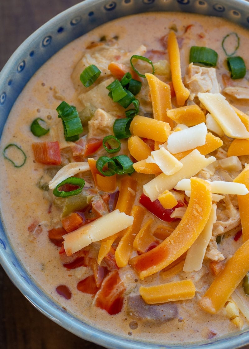 This Creamy Cajun Chicken Soup is loaded with tender chicken, peppers, onions, celery and cajun spices! You can enjoy a large serving of this cheesy keto soup recipe for only 8 net carbs!