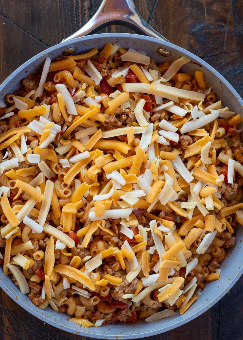 This easy Taco Mac recipe is a quick, one-pan, 30-minute meal packed with taco meat, noodles and cheese! Perfect for busy weeknights and family dinners. 