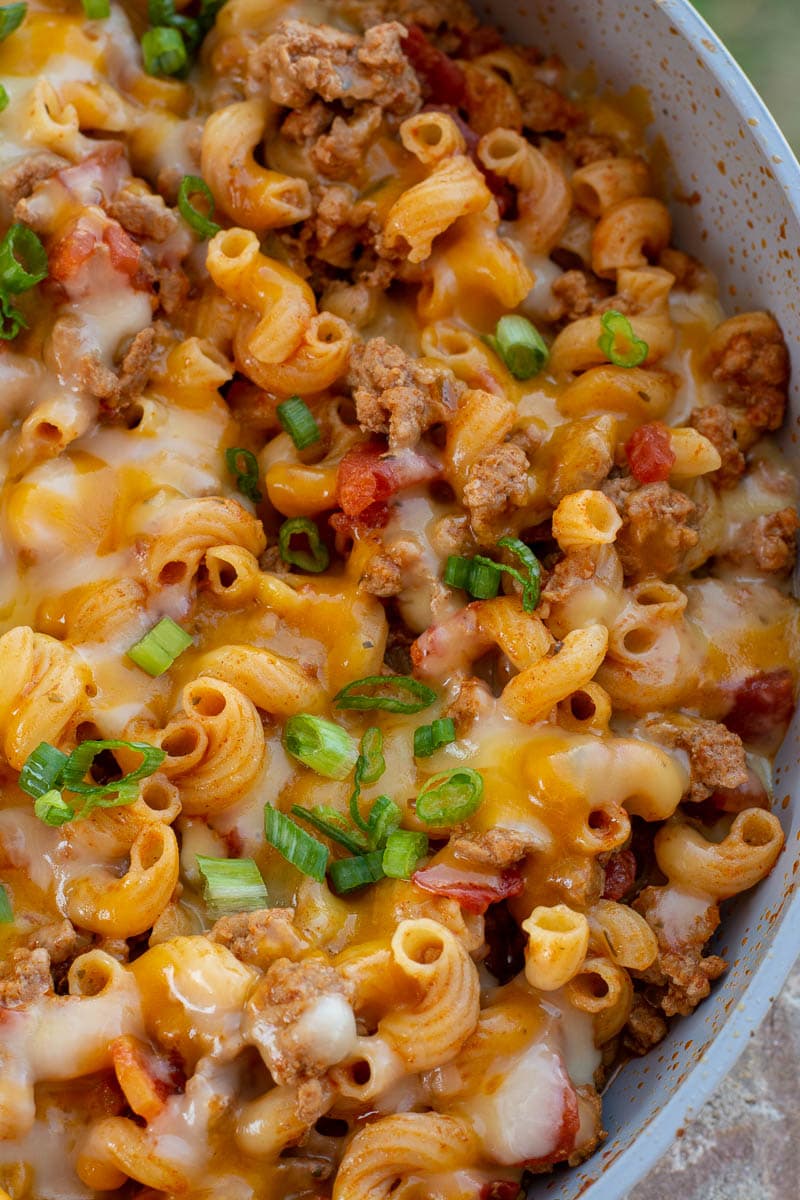 This easy Taco Mac recipe is a quick, one-pan, 30-minute meal packed with taco meat, noodles and cheese! Perfect for busy weeknights and family dinners. 