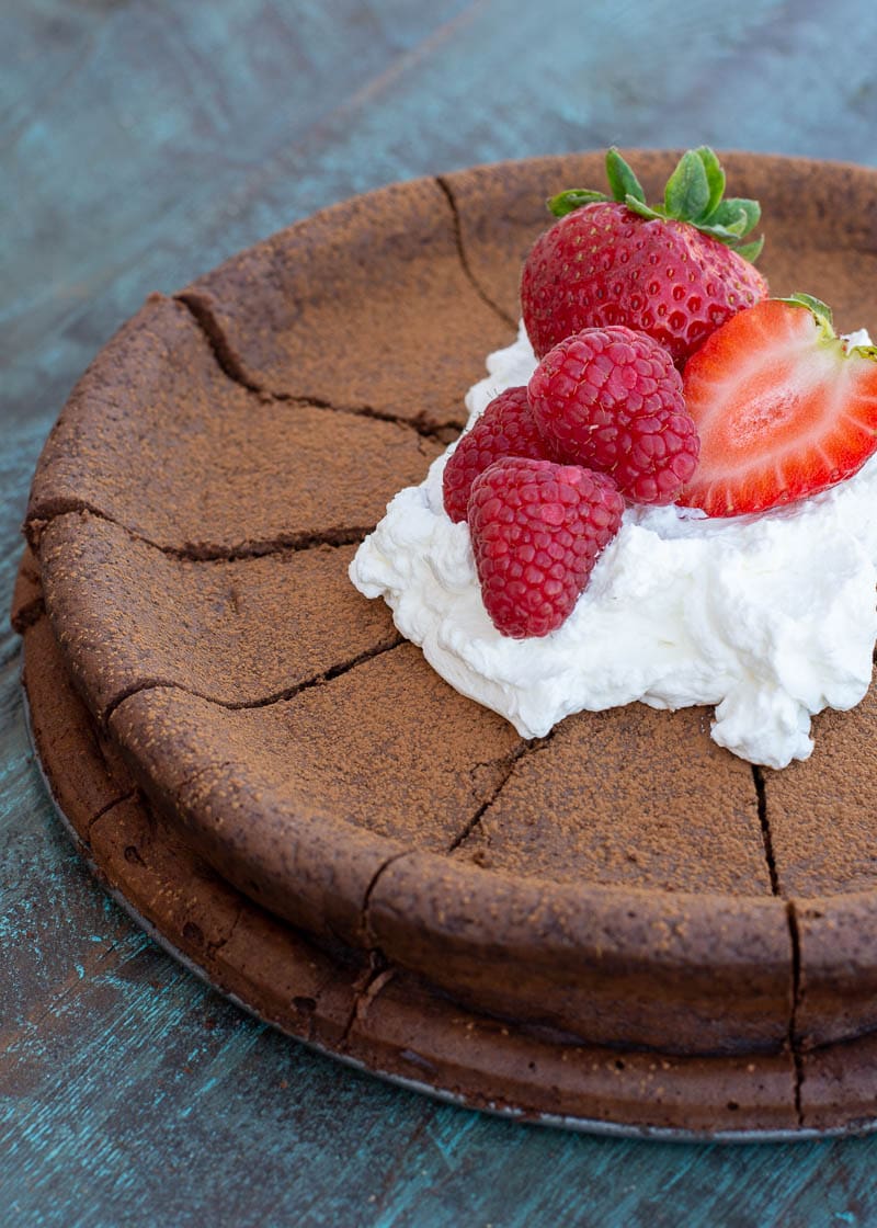 This Flourless Chocolate Cake Recipe is perfect for special occasions! This rich, decadent, fudgy cake is low carb, keto-friendly and completely gluten free! 