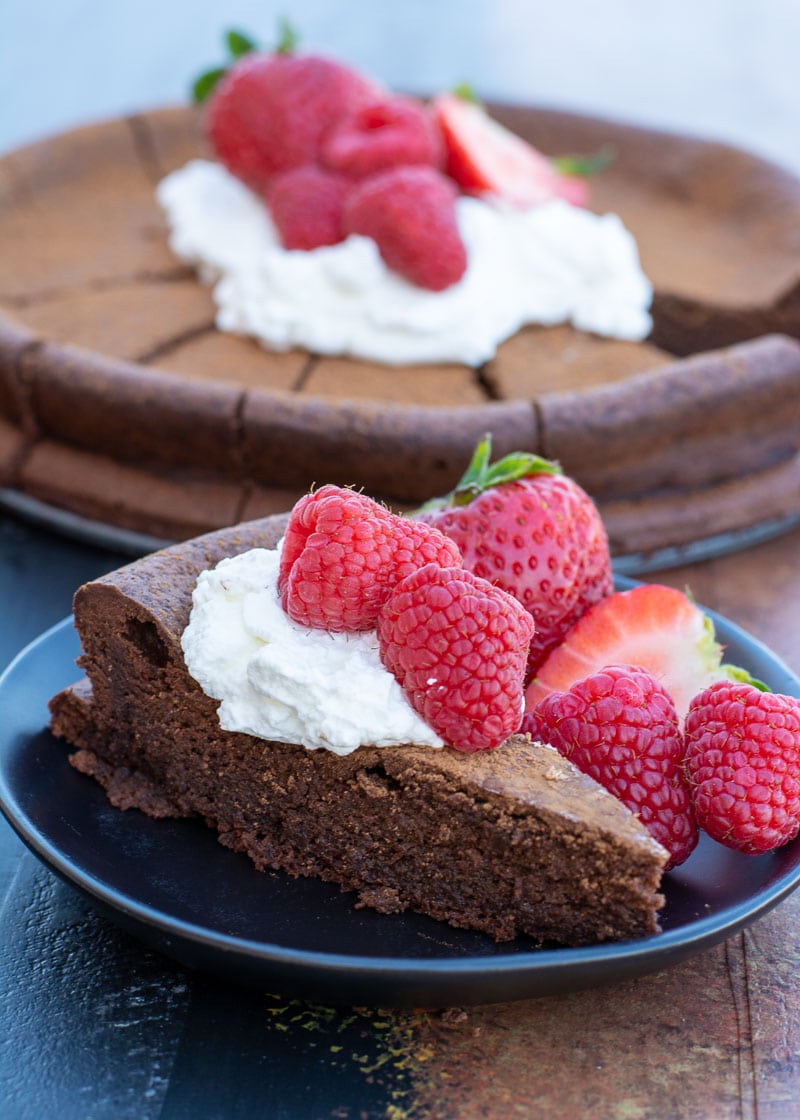 This Flourless Chocolate Cake Recipe is perfect for special occasions! This rich, decadent, fudgy cake is low carb, keto-friendly and completely gluten free! 