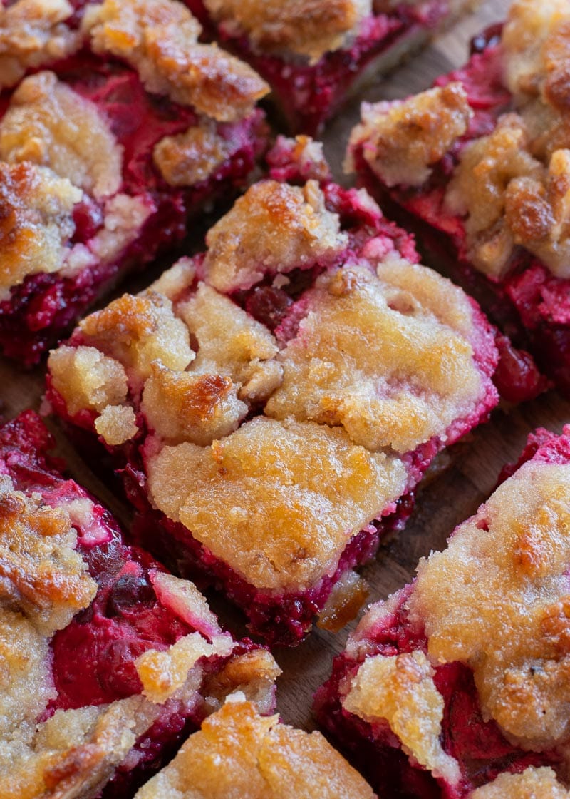 These Cranberry Bars are the perfect dessert to bring to a family gathering, potluck or holiday celebration. This keto dessert is sweet, tart, deliciously satisfying, and under 5 net carbs!