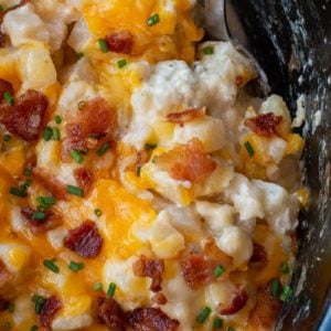 These Crockpot Cheesy Potatoes require a few basic ingredients and no prep! Simply dump the ingredients for these cheesy potatoes in a slow cooker, mix and forget it! This is the best side dish recipe!