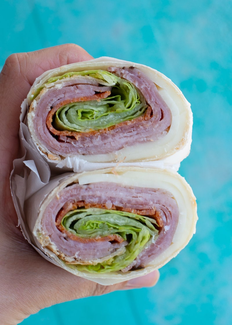 This Loaded Italian Wrap is the perfect quick no cook recipe! Ham, salami, pepperoni and provolone are all wrapped in a tortilla- this is great for keto meal prep, a light snack or a no fuss dinner!