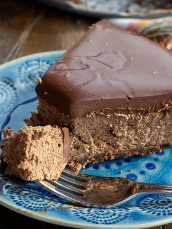 Decadent Mocha Cheesecake makes the perfect low carb dessert! A chocolate shortbread crust is topped with creamy mocha cheesecake and silky smooth dark chocolate ganache for less than 7 net carbs! 