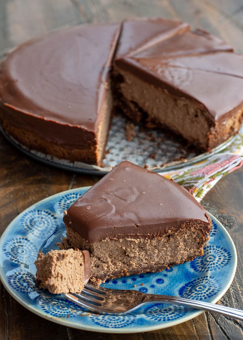 Decadent Mocha Cheesecake makes the perfect low carb dessert! A chocolate shortbread crust is topped with creamy mocha cheesecake and silky smooth dark chocolate ganache for less than 7 net carbs! 