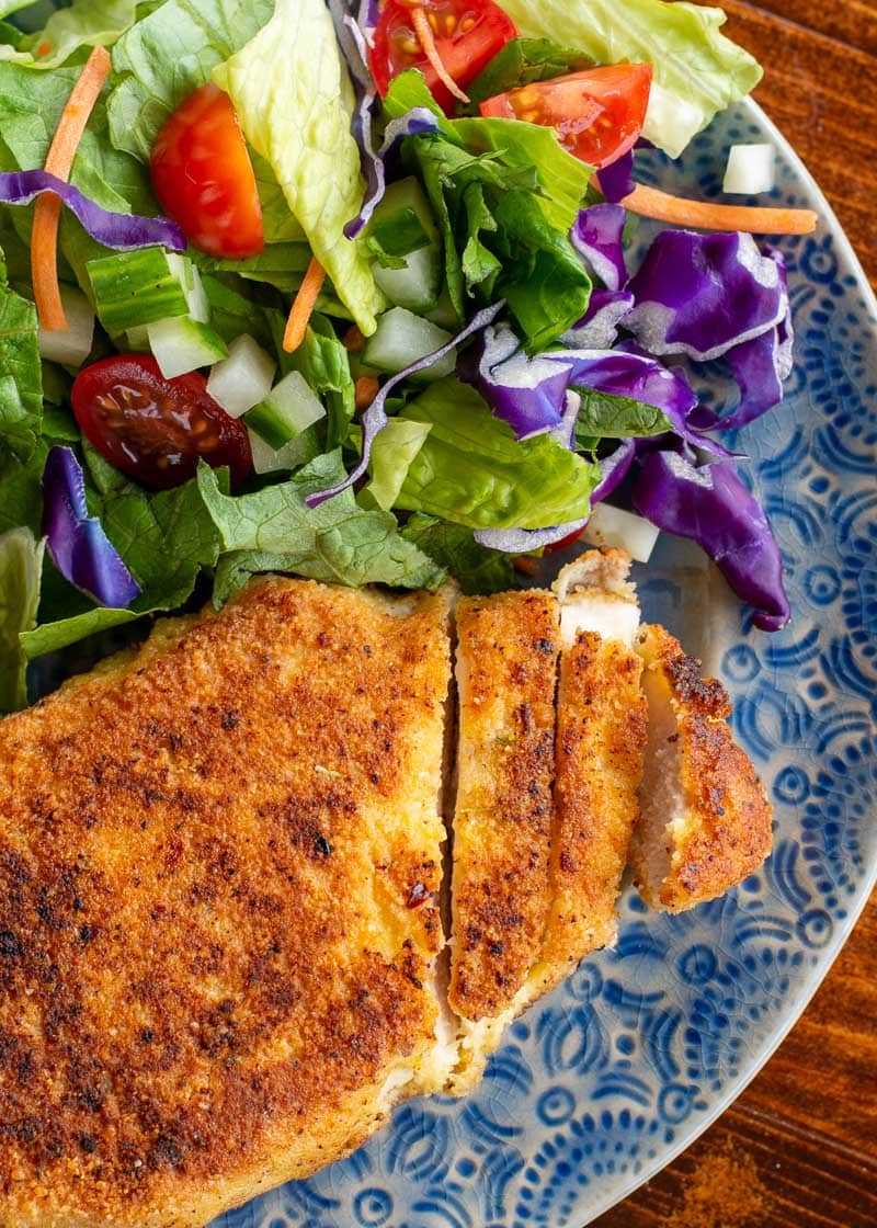 Crispy Parmesan Crusted Chicken is the perfect weeknight meal! This easy chicken recipe  requires basic ingredients and is gluten free, low carb and keto-friendly! 