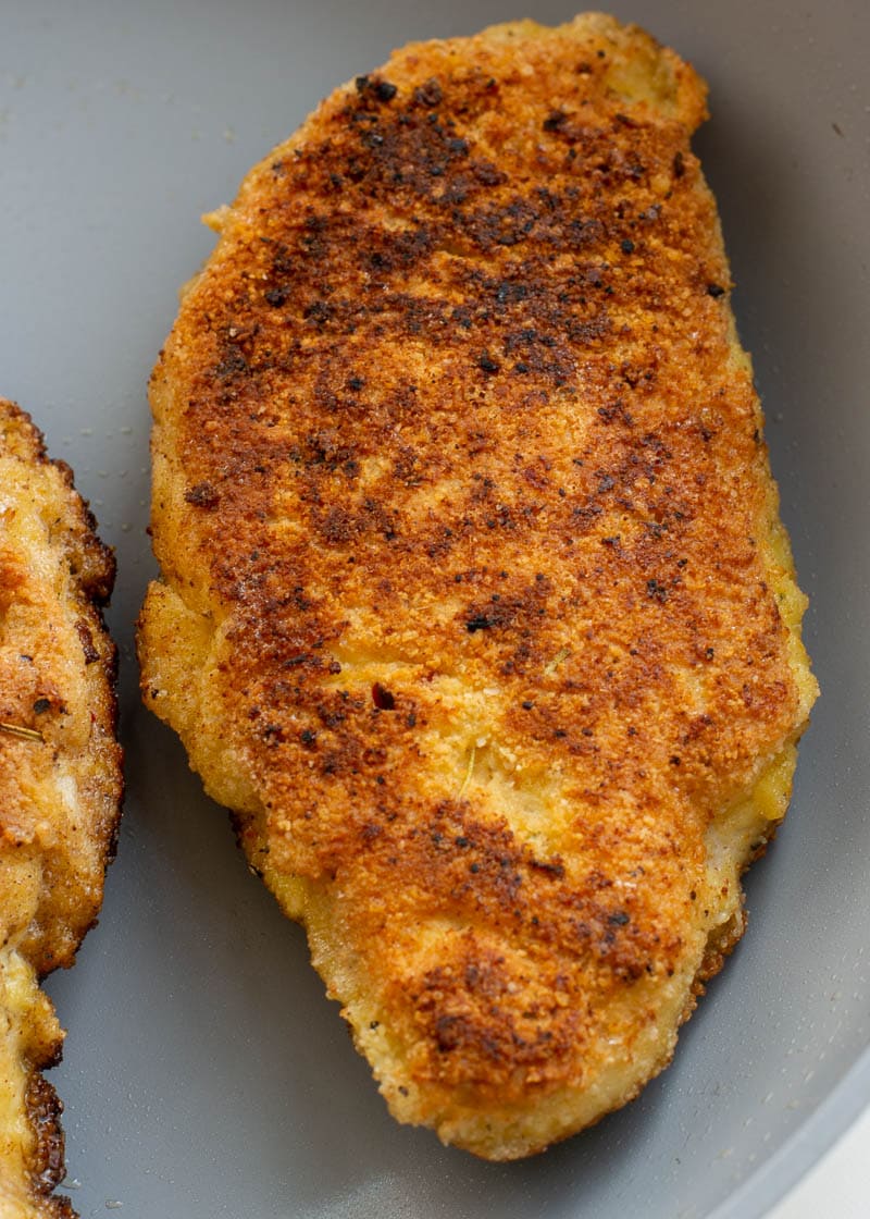 Crispy Parmesan Crusted Chicken is the perfect weeknight meal! This easy chicken recipe  requires basic ingredients and is gluten free, low carb and keto-friendly! 
