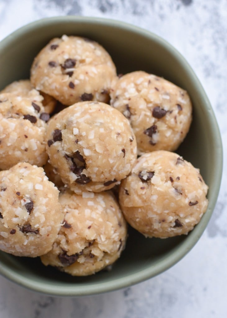 no-bake cookie dough bites in a green bowl