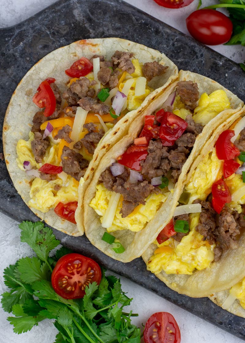 These Easy Breakfast Tacos are the best way to start the day! This simple breakfast recipe is packed full of protein and can be made ahead of time for a quick morning.